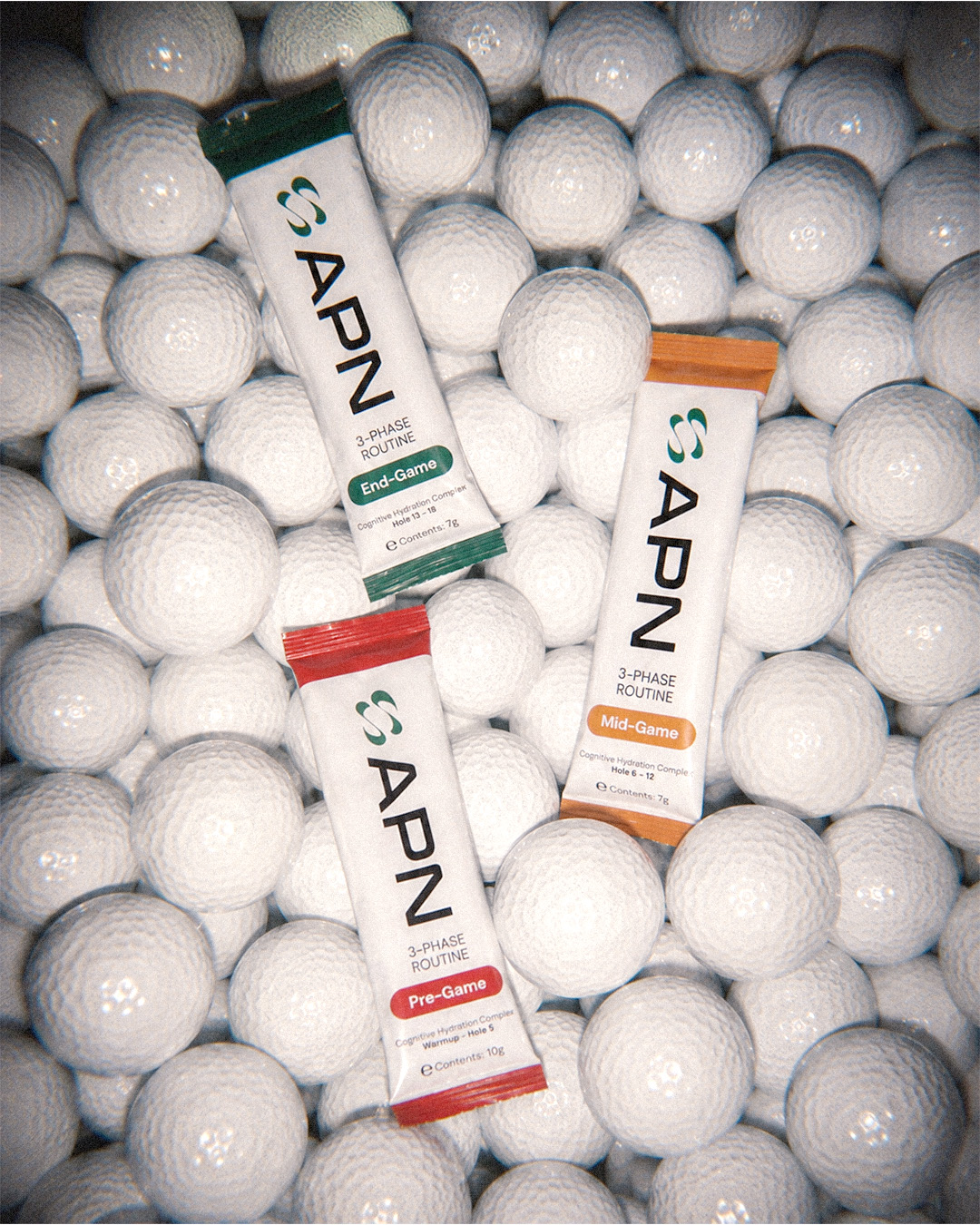 APN 3-phase hydration system sachets on golf balls