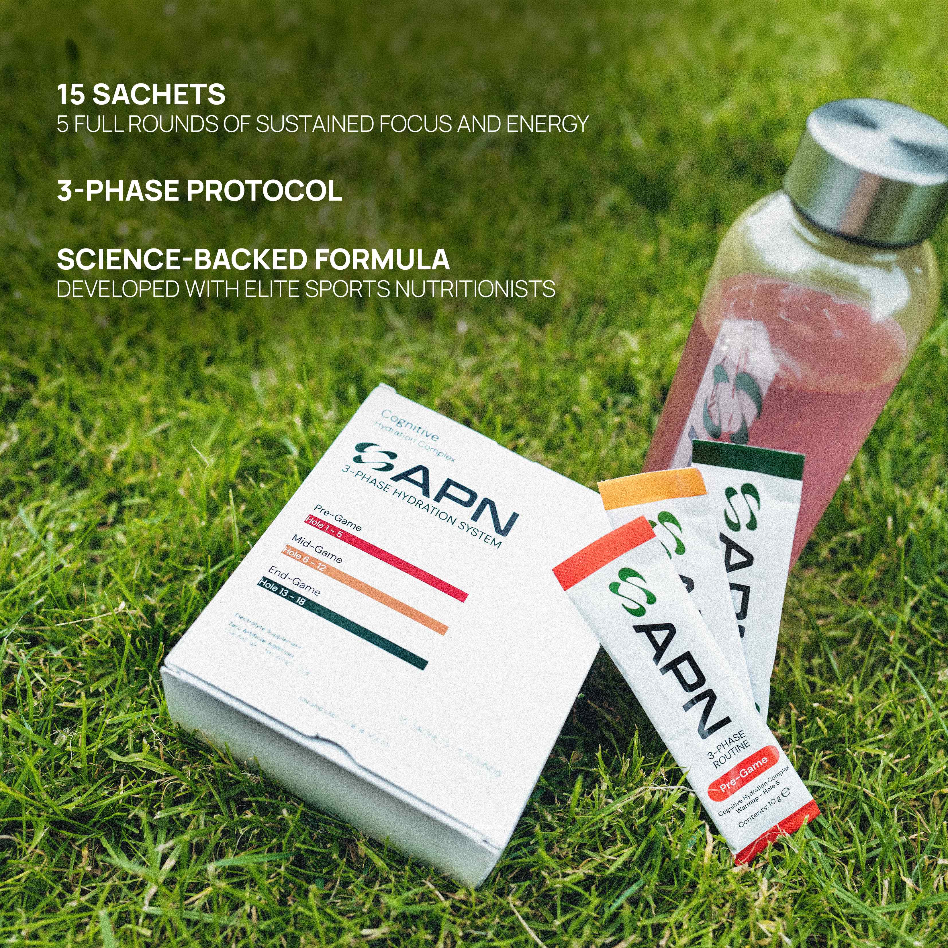 APN FUEL box with Pre-Game sachets and an APN bottle on the grass